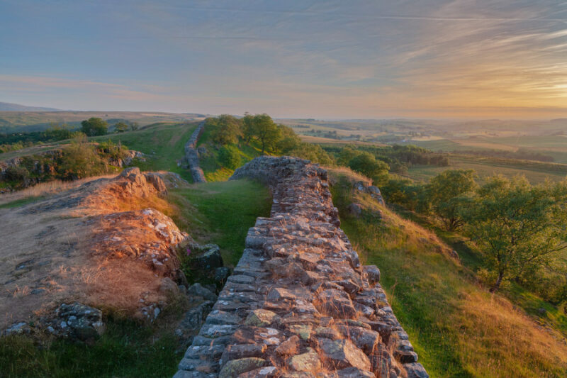 Zonsondergang bij Hadrians Wall Northumberland